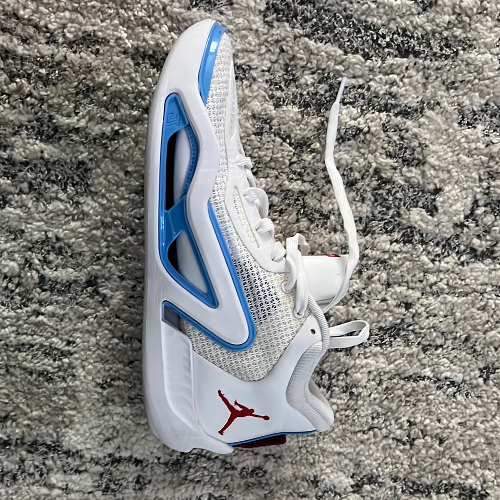 Jordan Blue and White Sneakers with Breathable Mesh and Dynamic Overlays
